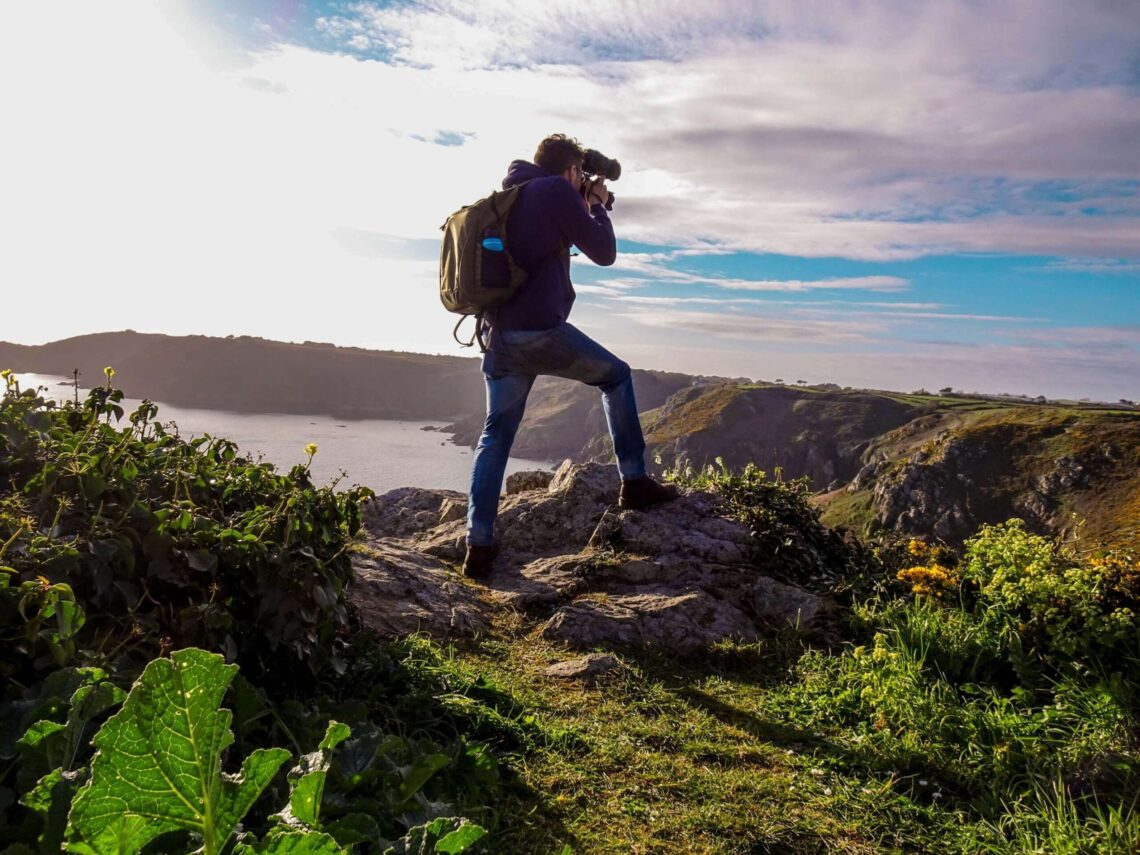 campbell taking a photo at Saints Bay viewpoint