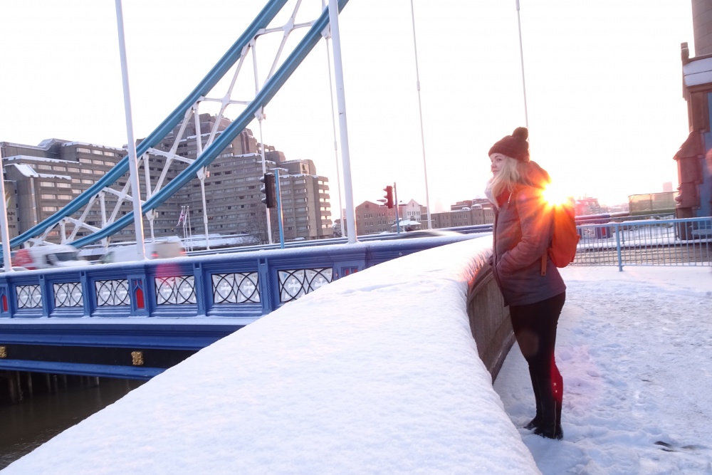 Gemma overlooking the River Thames at sunrise.