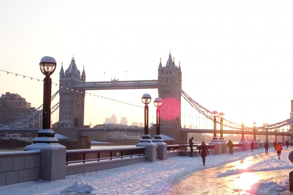 Tower Bridge at sunrise in the snow.