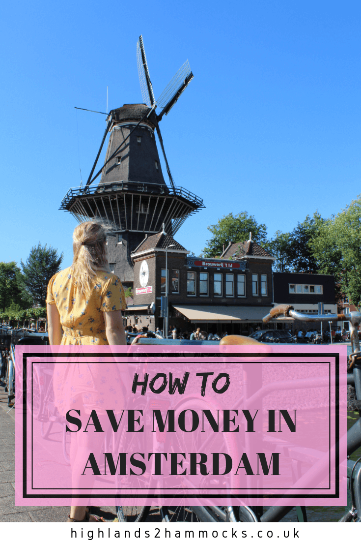 Gemma looking at a windmill in Amsterdam