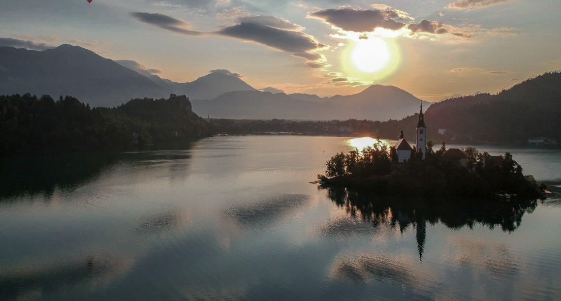 A sunrise over the island on Lake Bled