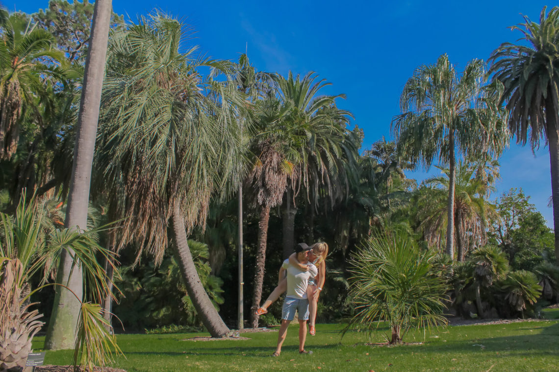 couple playing around in the Melbourne Botanical Gardens