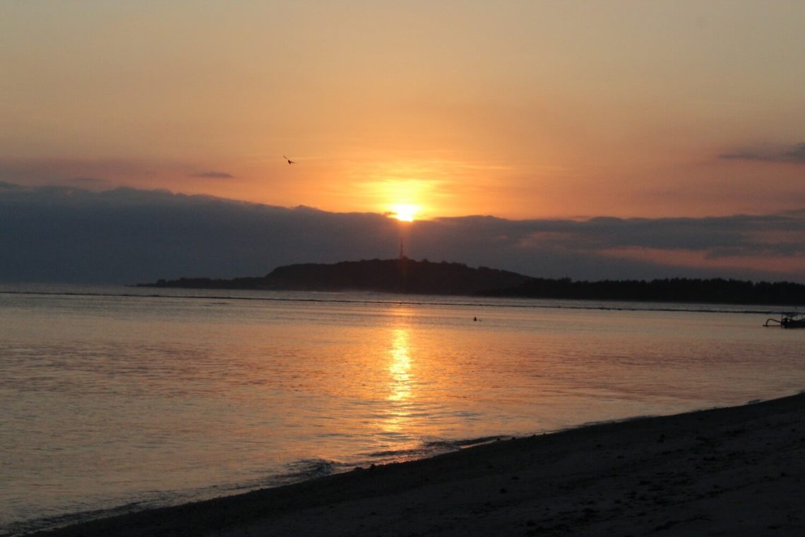 Orange skies as the sun sets over Gili Air