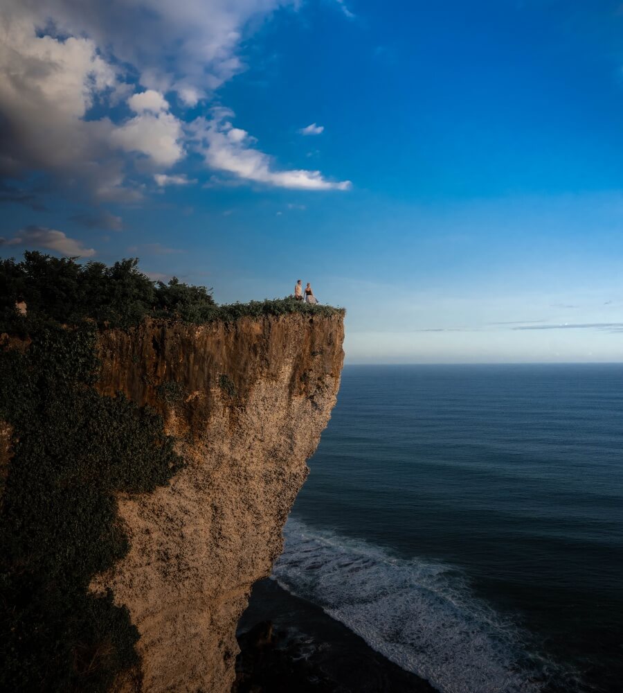 A rocky outcrop at Karang Boma makes the perfect spot for a sunset picture.