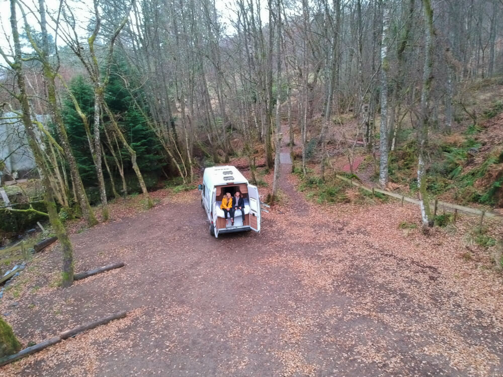 campervan in the middle of forest