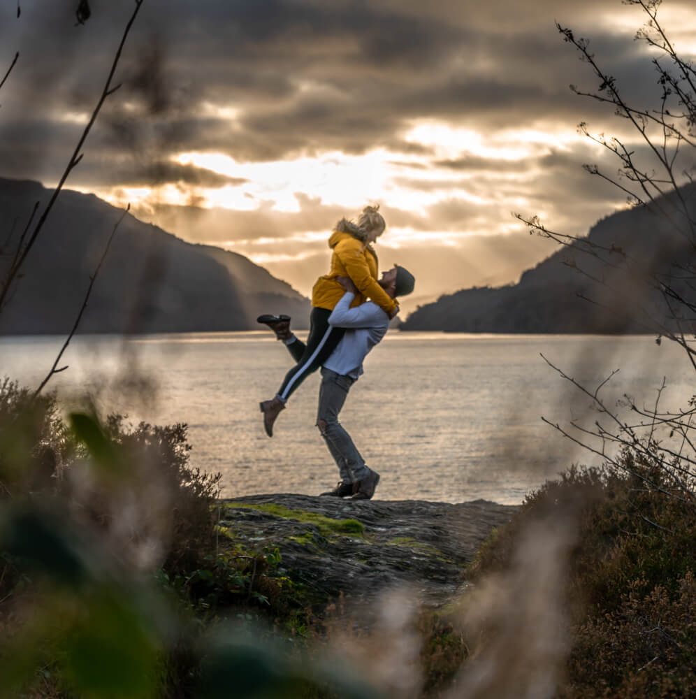 campbell lifting gemma up infront of the loch