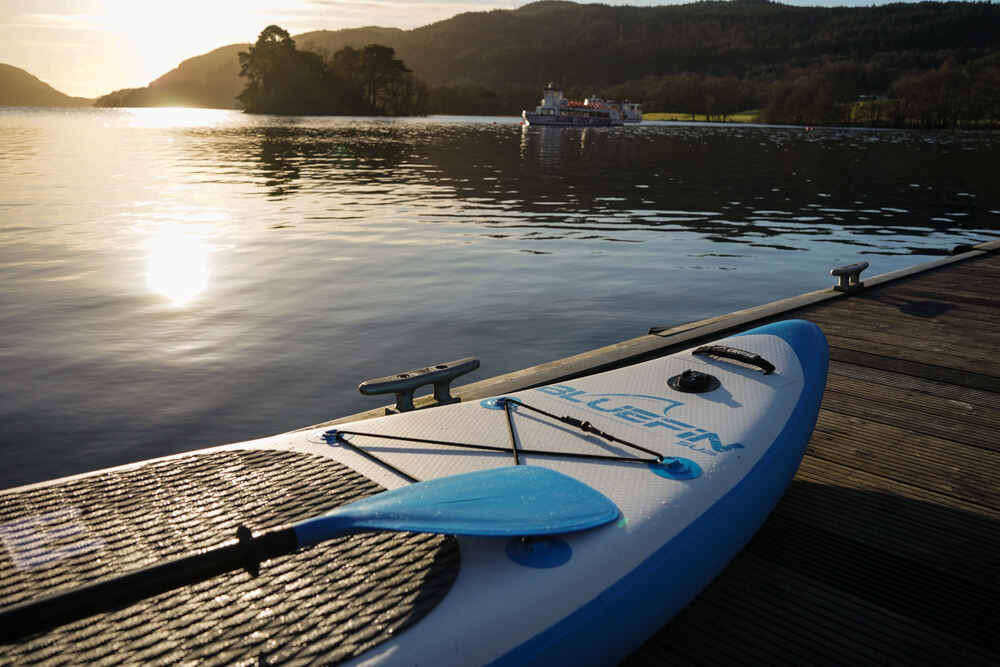 SUP sitting on the Inveruglus dock dock at sunrise