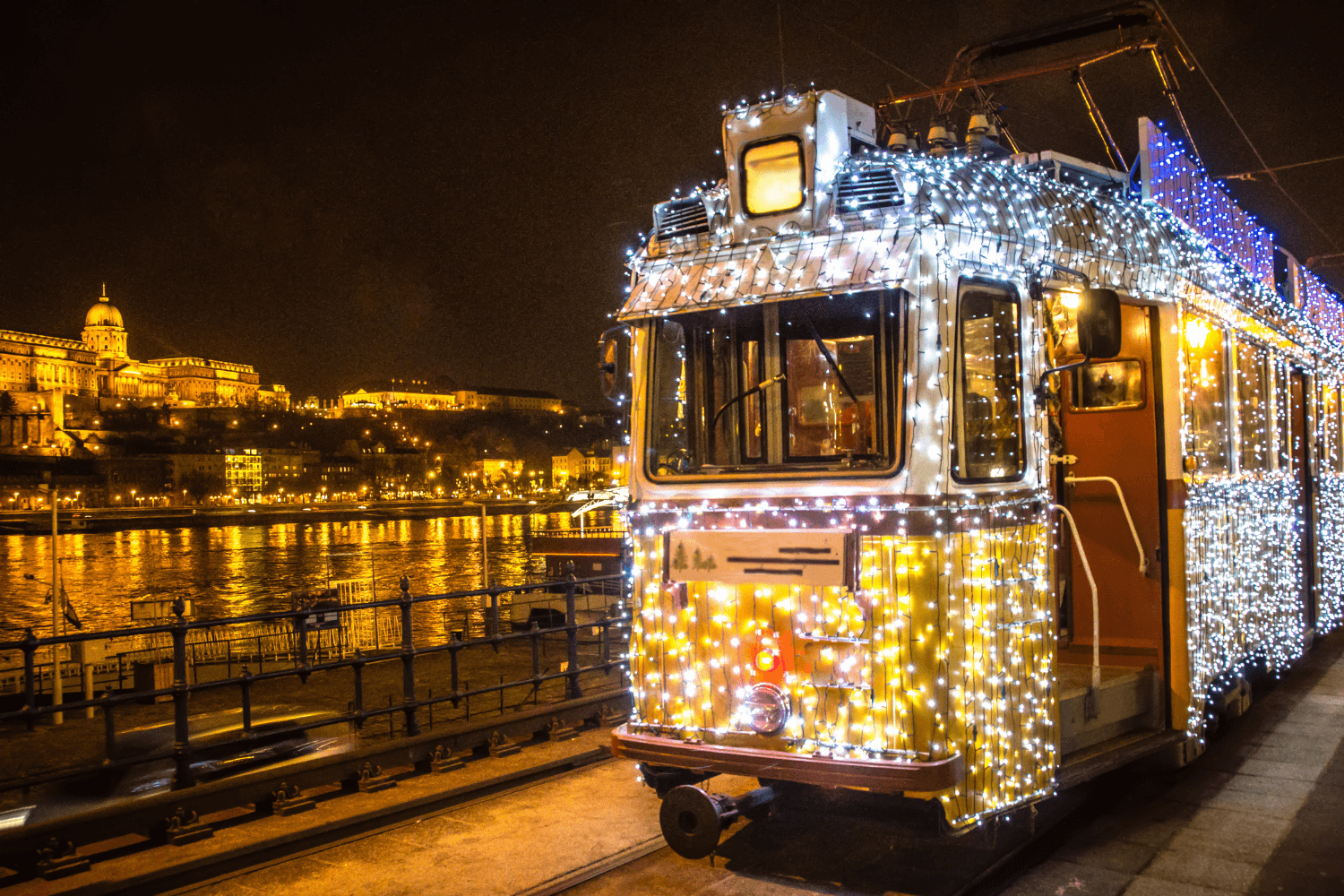 tram lit up with christmas lights in munich