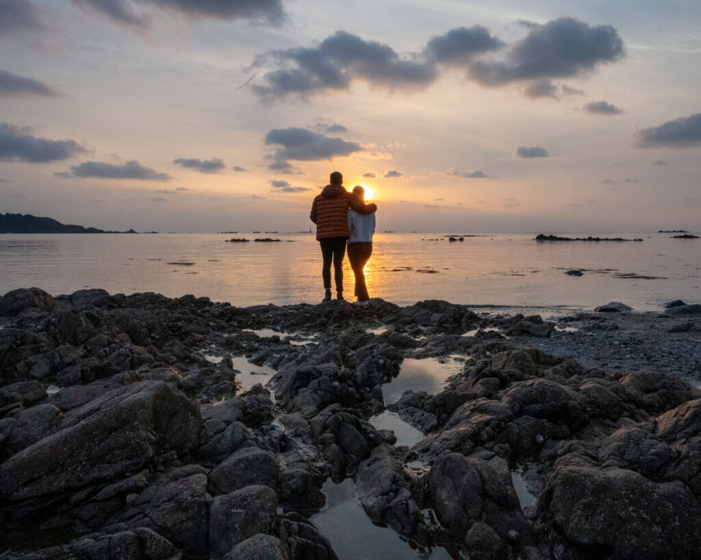 Gemma and Campbell at sunset L'eree Guernsey