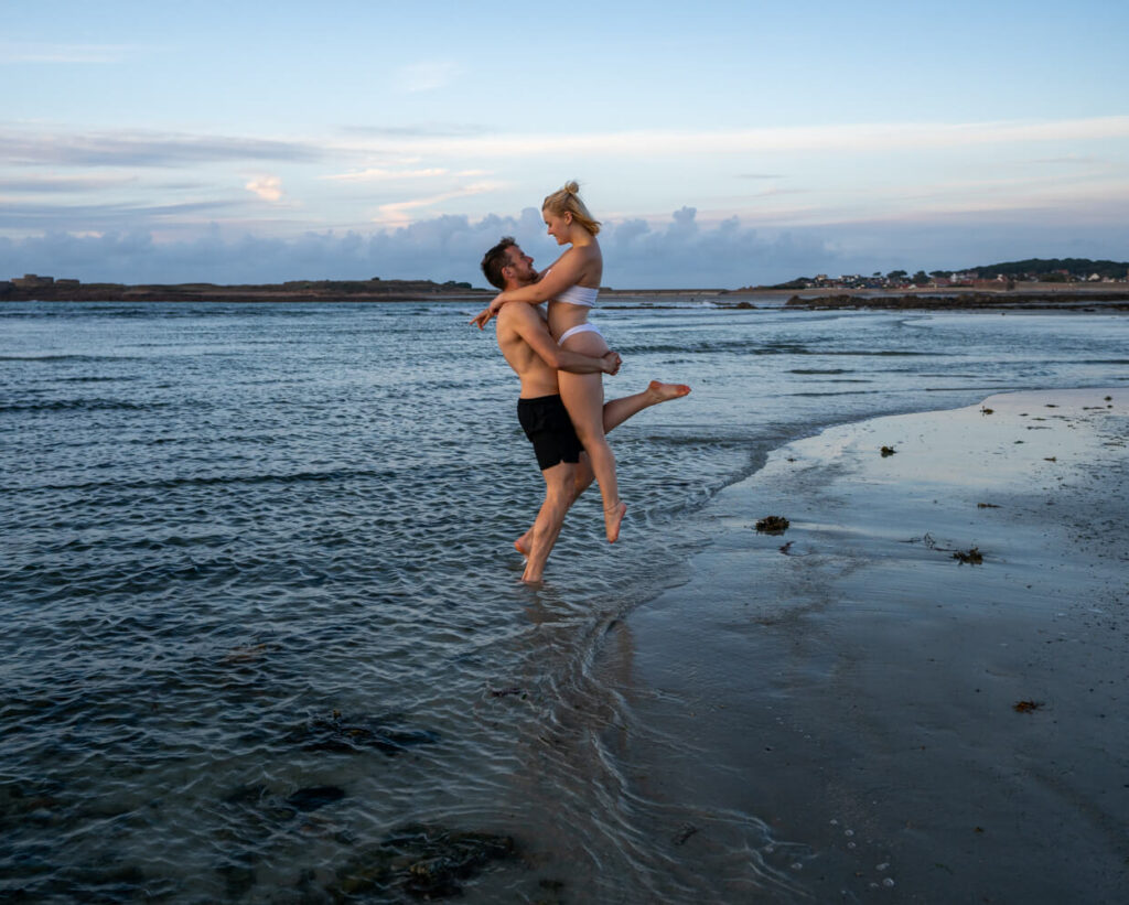 Campbell lifting Gemma on Vazon beach