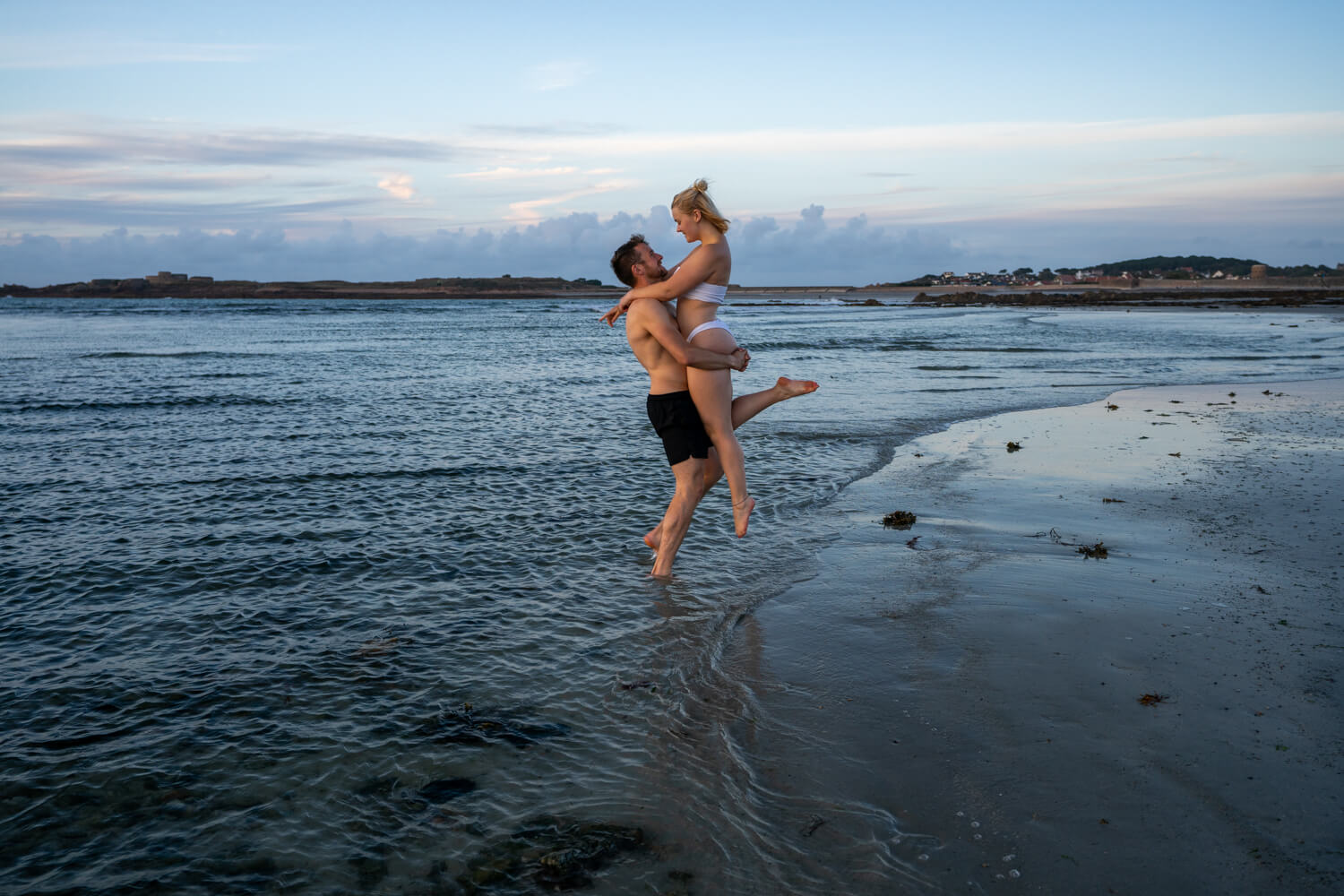 Campbell lifting Gemma on Vazon beach