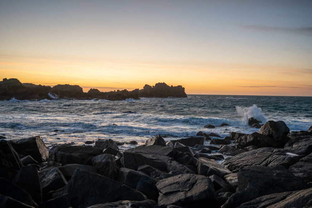 Watching the sunset at Portinfer Beach