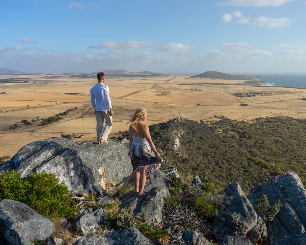 couple looking at view from mt greenly