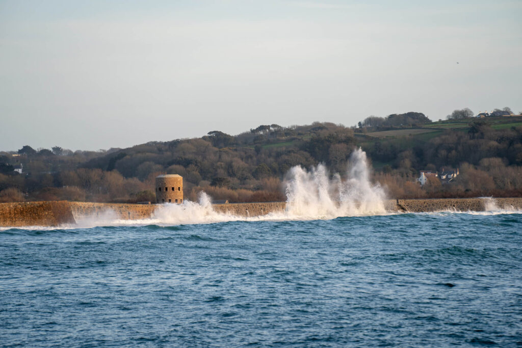 vazon waves crashing off wall