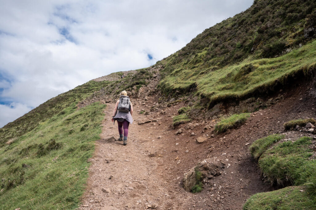 girl walking up hill