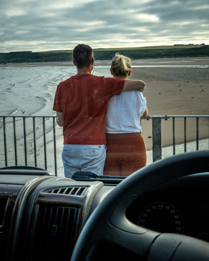 couple standing at cruden bay harbour