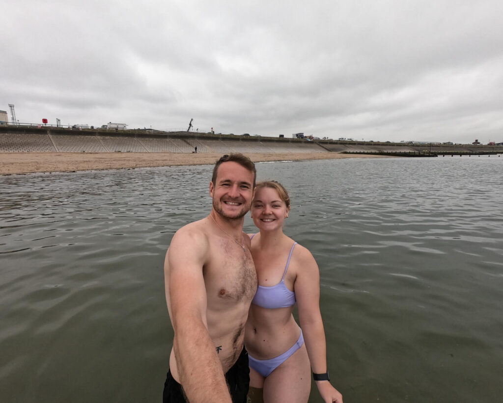 couple in water on Aberdeen beach
