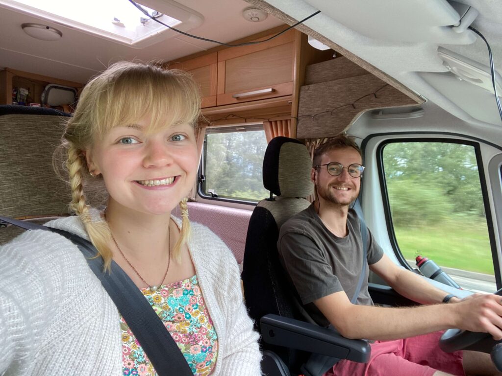 couple driving in van