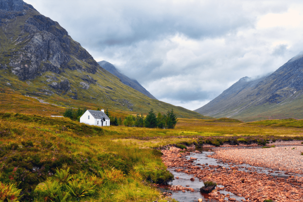 house under mountains in Glencoe