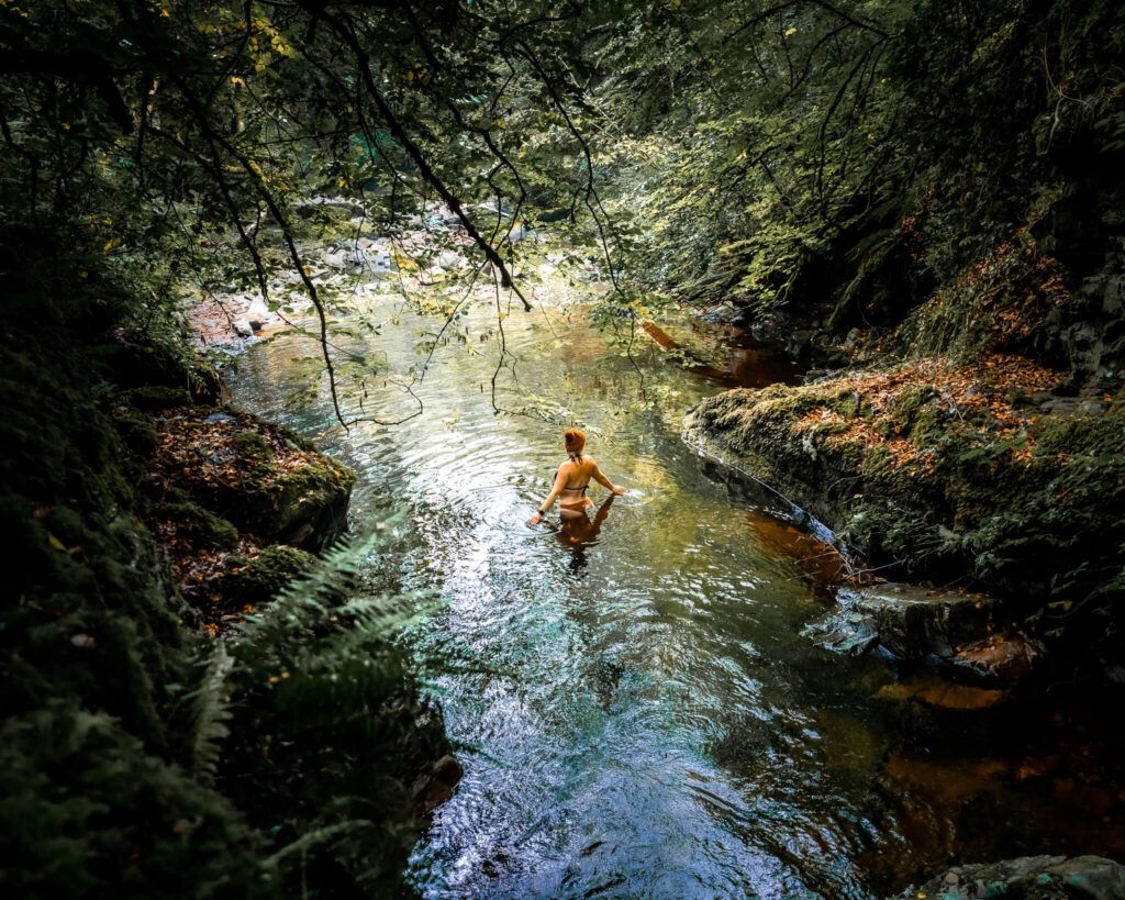 gemma swimming in a river in Golspie