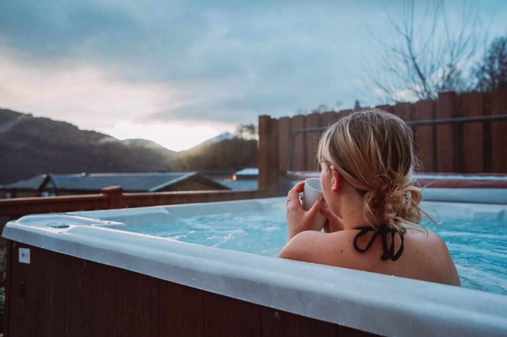 girl sitting in hot tub