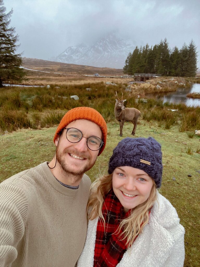 couple selfie with deer