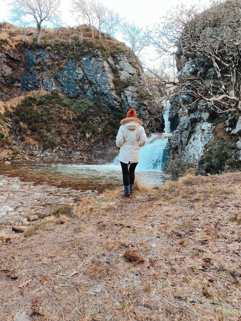 girl looking at allt daraich falls