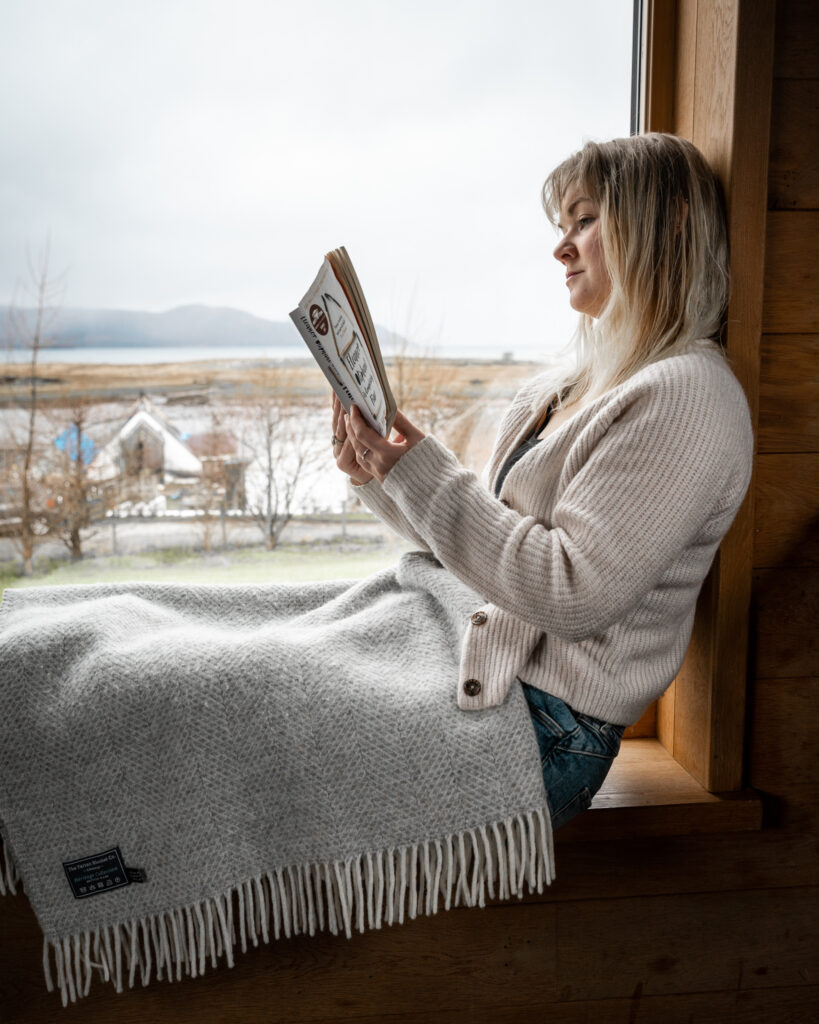 girl reading book with view